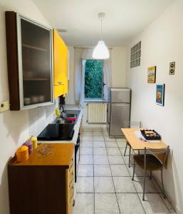 Kuchyň nebo kuchyňský kout v ubytování Casa L' Aurora Viola