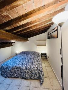 Postel nebo postele na pokoji v ubytování Casa L' Aurora Viola