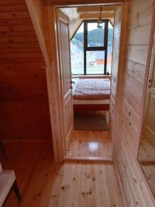Rúm í herbergi á Chalet Hill Zabljak