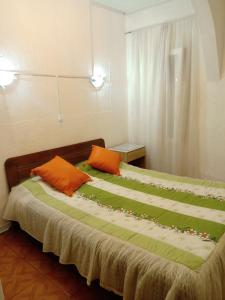 Postel nebo postele na pokoji v ubytování Hotel Capric