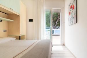 Postel nebo postele na pokoji v ubytování Hotel Ettoral