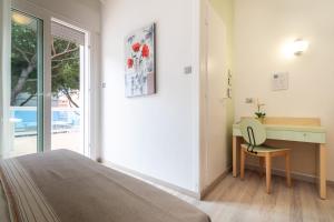 Postel nebo postele na pokoji v ubytování Hotel Ettoral
