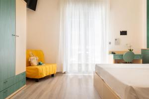 Postel nebo postele na pokoji v ubytování Hotel Ettoral