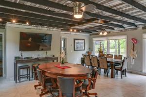a dining room with a wooden table and chairs at Lakefront Home in Quiet Cove with Patio and Kayaks! in Old Hickory