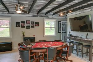 a poker room with a table and chairs at Lakefront Home in Quiet Cove with Patio and Kayaks! in Old Hickory