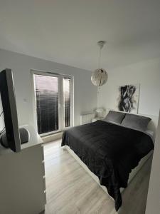 Posteľ alebo postele v izbe v ubytovaní Apartament Księcia Janusza