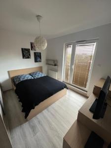 Posteľ alebo postele v izbe v ubytovaní Apartament Księcia Janusza