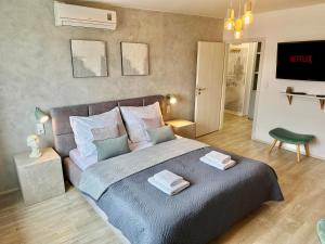 Posteľ alebo postele v izbe v ubytovaní Beautiful Apartment Dlouhá