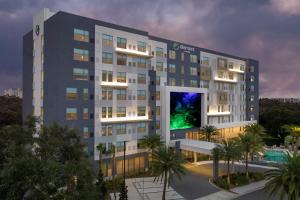 a rendering of a hotel with a large building at Element Orlando Universal Blvd. in Orlando