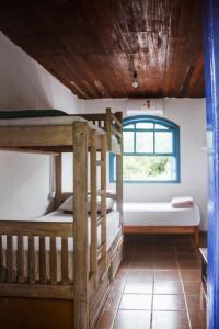 Krevet ili kreveti na kat u jedinici u objektu Flow Hostel Juquehy