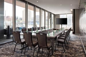 a conference room with a long table and chairs at Residence Inn by Marriott Seattle Downtown Convention Center in Seattle