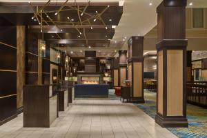 a lobby of a hotel with a fireplace at Courtyard by Marriott Denver Downtown in Denver