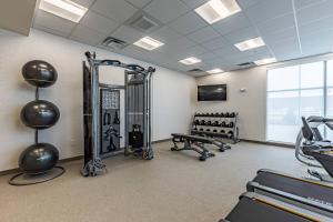 a gym with treadmills and machines in a room at SpringHill Suites by Marriott Fort Wayne North in Sunnybrook Acres