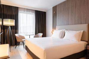 Postel nebo postele na pokoji v ubytování AC Hotel by Marriott Inverness