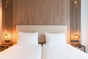 Postel nebo postele na pokoji v ubytování AC Hotel by Marriott Inverness