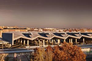 a view of a building with a city in the background at AC Hotel Atocha by Marriott in Madrid