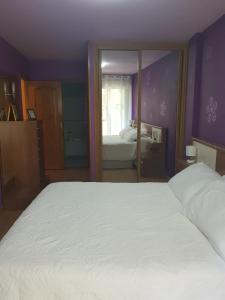 Posteľ alebo postele v izbe v ubytovaní Casa Fandiño