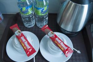 Příslušenství pro přípravu čaje a kávy v ubytování Indra Hotel Ipoh