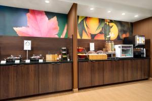 a restaurant with a counter with food on it at Fairfield Inn by Marriott Philadelphia West Chester/Exton in Exton