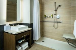 a bathroom with a sink and a shower at Element Las Vegas Summerlin in Las Vegas