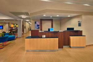 a lobby of a hospital with a waiting room at Fairfield Inn & Suites Boca Raton in Boca Raton