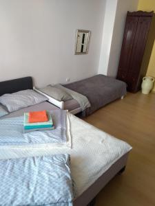 Posteľ alebo postele v izbe v ubytovaní Hostel Staromiejski