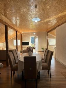 a dining room with a table and chairs at Apartment Perović in Kotor