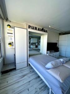 Posteľ alebo postele v izbe v ubytovaní ESTUDIO en primera línea de playa + 32 fotografií