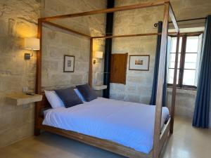 Letto o letti in una camera di Razzett Ghasri