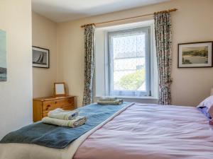 Postel nebo postele na pokoji v ubytování Cottage View