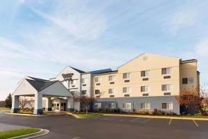 a rendering of the front of a hotel with a parking lot at Fairfield Inn & Suites Saginaw in Saginaw