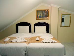 Postel nebo postele na pokoji v ubytování Tolga Hotel