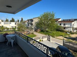 a balcony with a view of a street at Apartments Near The Coast - Milla in Ulcinj