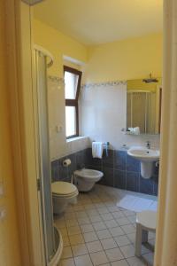 Koupelna v ubytování Hotel Saturno Fonte Pura