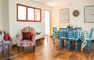 a dining room with a table and chairs at 3 Bedroom Lovely Home In Hendaye in Hendaye