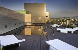En terrasse eller udendørsområde på Hotel Alfonso