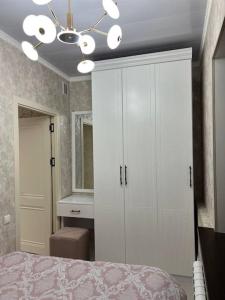 Postel nebo postele na pokoji v ubytování Miracle Apartment