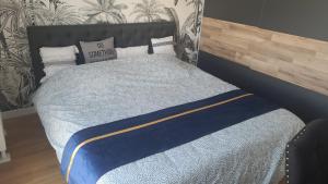 Posteľ alebo postele v izbe v ubytovaní Appartement chic 5 min Disneyland/Vallée Village