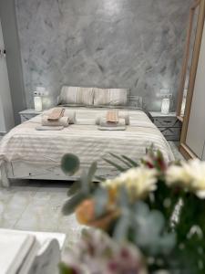 מיטה או מיטות בחדר ב-Golden Rose