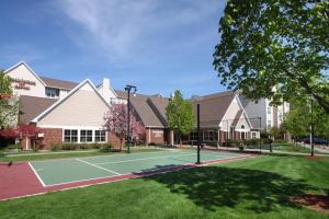 a tennis court in front of a building at Residence Inn by Marriott West Springfield in West Springfield
