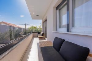 Posezení v ubytování Sunluxvilla ,Heated Pool, IR Sauna