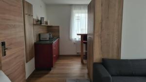 A cozinha ou kitchenette de M-A-S-Hotel