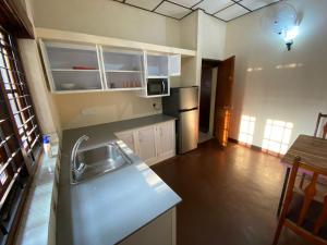 Kuchyň nebo kuchyňský kout v ubytování Oasis Colombo