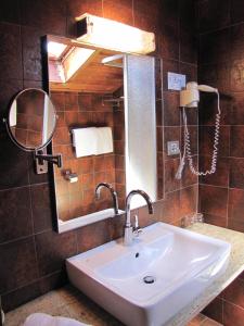 Vannituba majutusasutuses Hotel Am Fels