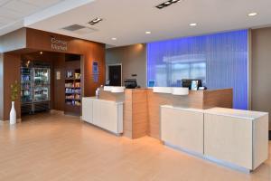 a lobby of a pharmacy with a pharmacy counter at Fairfield Inn & Suites by Marriott Sacramento Airport Woodland in Woodland