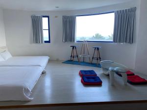 Voodi või voodid majutusasutuse Fuyue Sea View B&B toas
