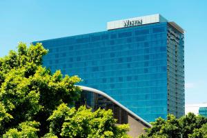 a glass building with a sign on top of it at The Westin Cape Town in Cape Town