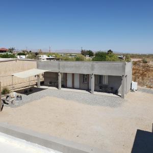 a house in the desert with a roof at Baja's Rest Stop in San Felipe
