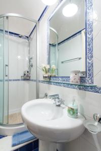 Ett badrum på Agli Antichi Quartieri Apartments