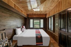Postel nebo postele na pokoji v ubytování Sin Chai Ecolodge